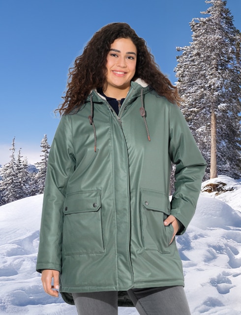 The model is wearing a light blue functional jacket