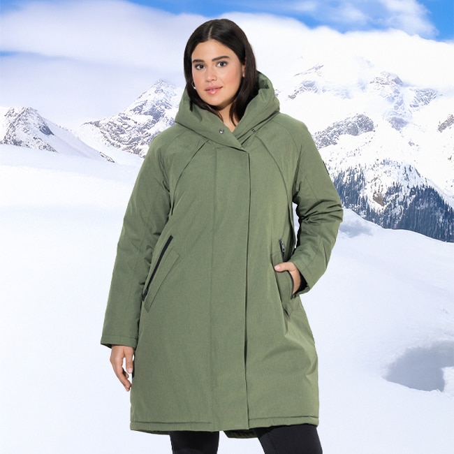 The model is wearing a black HYPRAR quilted jacket, which is water-repellent and has a hood.