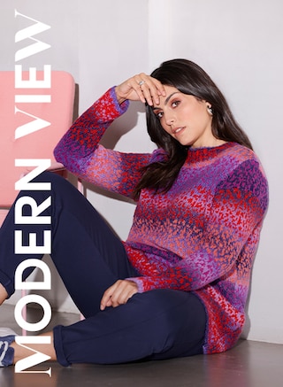 The model poses in a leo-look sweater from Modern View 