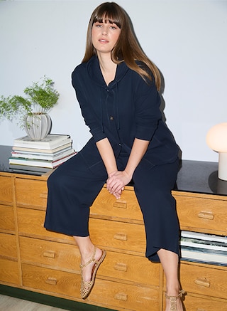The model poses in the new collection from PURE