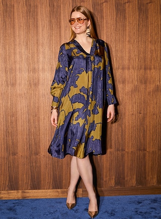 The model wears a blouse from Selection 			


