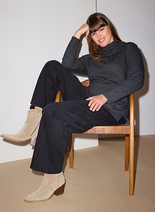 The model poses in the new collection from PURE