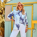 the model wears a blouse 