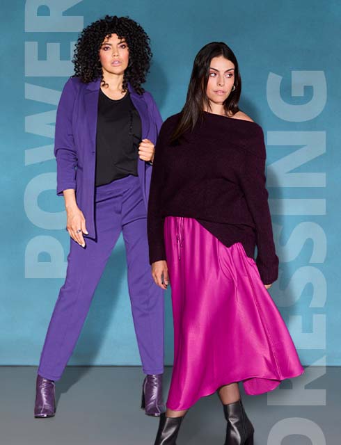 Three models pose in different outfits, suitable for the office.