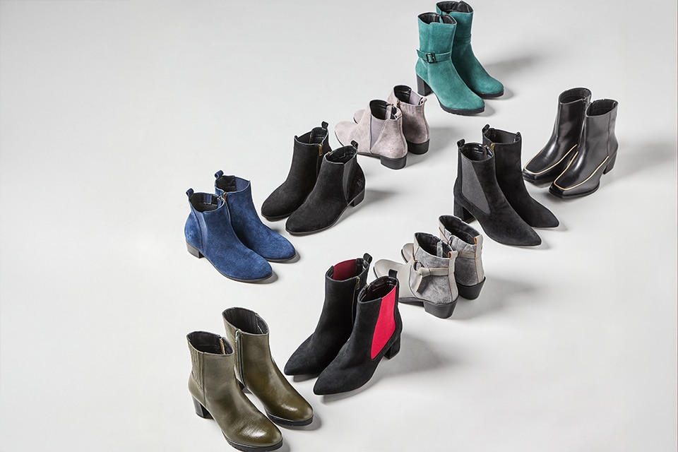 various boots in different colors 

