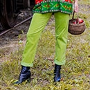 Close-up of green corduroy trousers 


