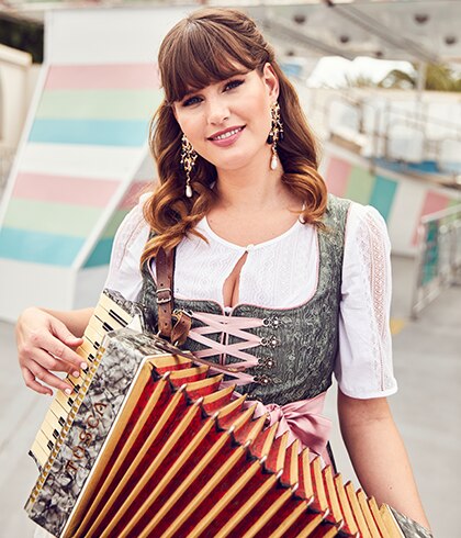 Close-up of a model holding an accordion