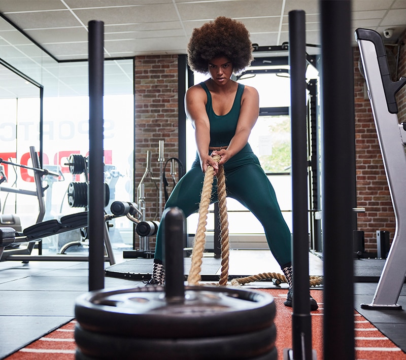 Woman is doing sports in a fitness room