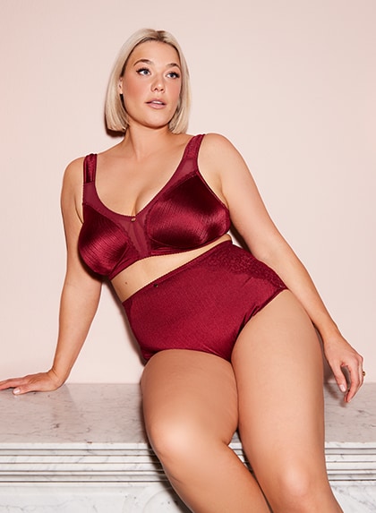 Brand The model is wearing a red bra and string